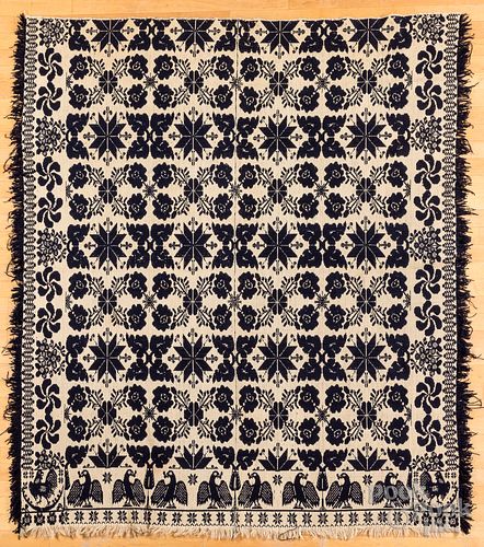BLUE AND WHITE JACQUARD COVERLET,