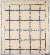 BLUE AND WHITE PATCHWORK QUILT
