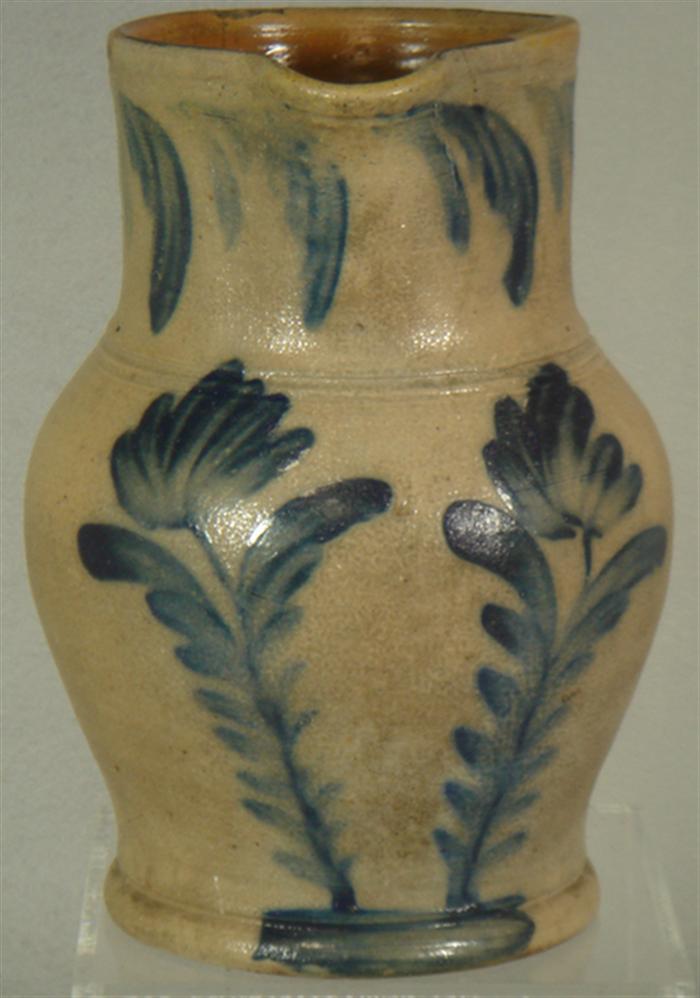 Blue decorated stoneware pitcher,