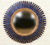 BLUE GLASS AND GILT MIRROR MAN
