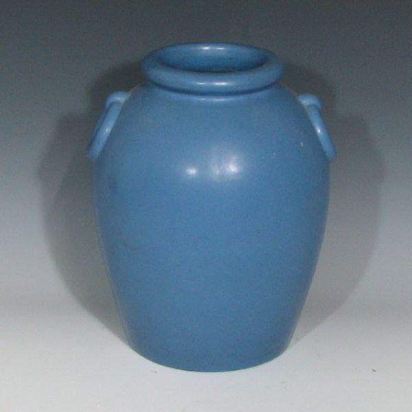 Blue matte ring-handled oil jar. 