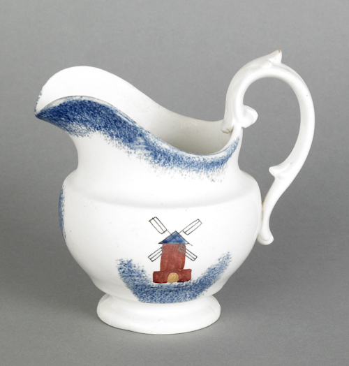 Blue spatter creamer with a
