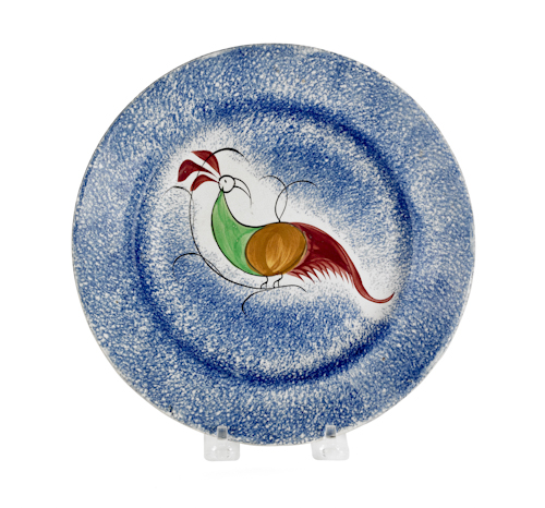 Blue spatter plate with a peafowl