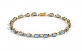 BLUE SPINEL AND FOURTEEN KARAT