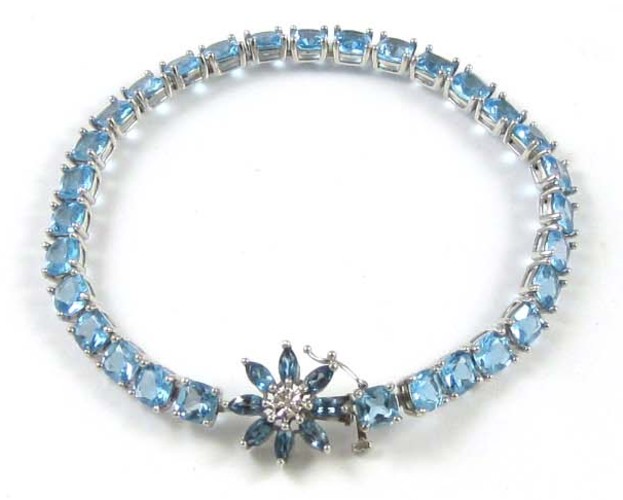 BLUE TOPAZ AND FOURTEEN KARAT WHITE