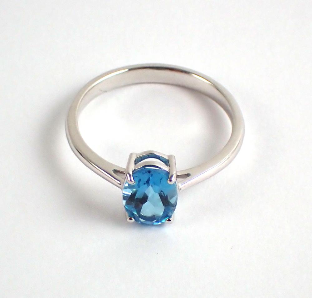 BLUE TOPAZ AND FOURTEEN KARAT WHITE