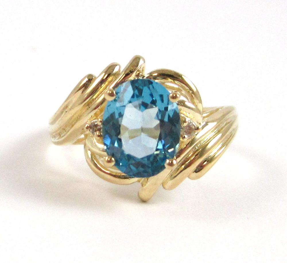 BLUE TOPAZ, DIAMOND AND FOURTEEN