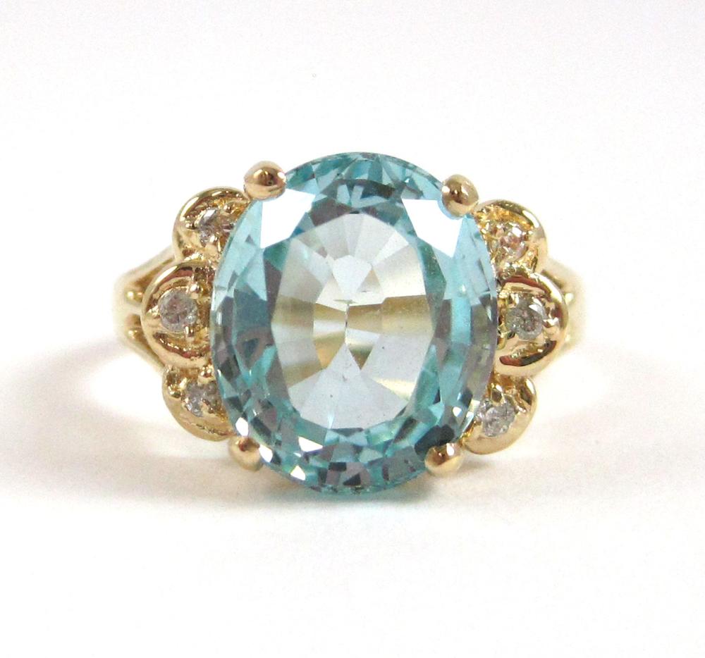 BLUE TOPAZ, DIAMOND AND FOURTEEN