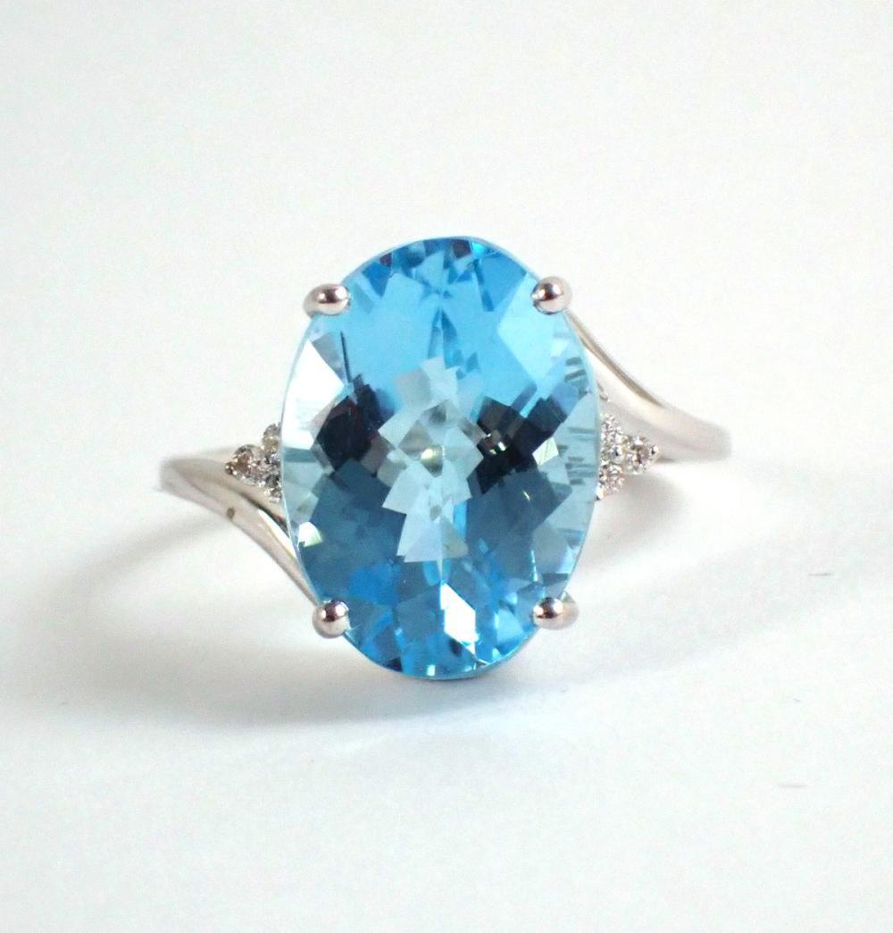 BLUE TOPAZ, DIAMOND AND FOURTEEN