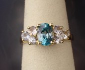 BLUE ZIRCON AND FOURTEEN KARAT