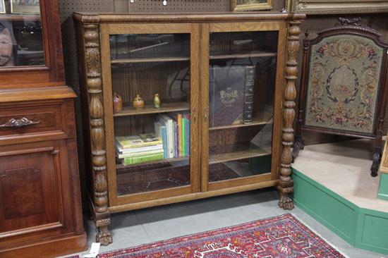 BOOKCASE. Oak having two large
