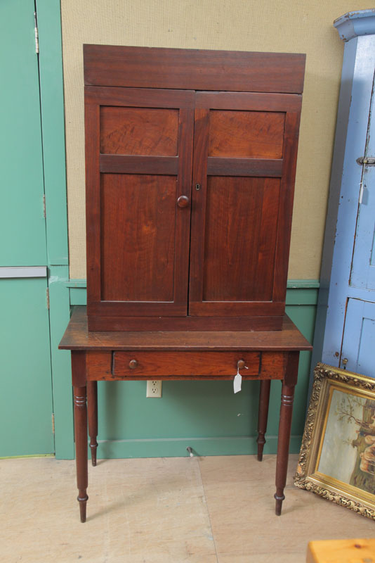 BOOKCASE ON TABLE. Marriage of a
