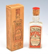 BOTTLE OF "NYE MACHINE OIL", U
