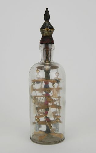 BOTTLE WHIMSEY WITH TASSEL