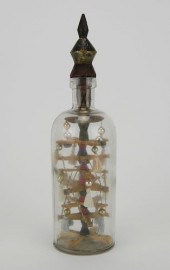 BOTTLE WHIMSEY WITH TASSEL TRE