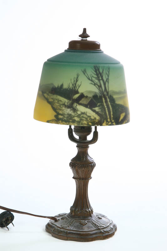 BOUDOIR LAMP. The small lamp has