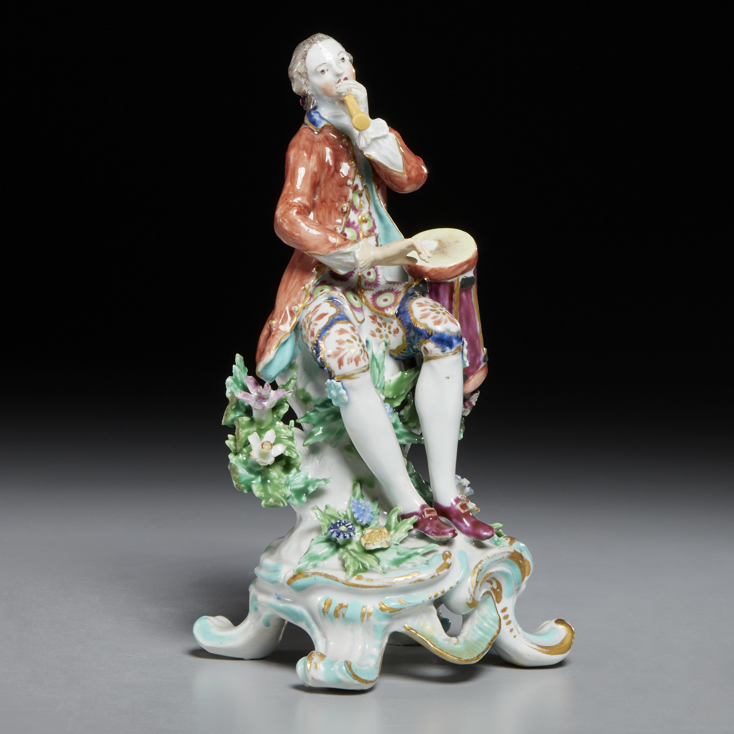 BOW FIGURE OF A MUSICIAN, 18TH C.