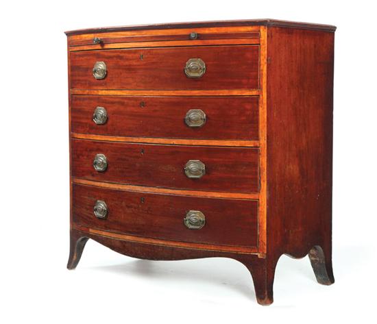 BOW FRONT CHEST OF DRAWERS.