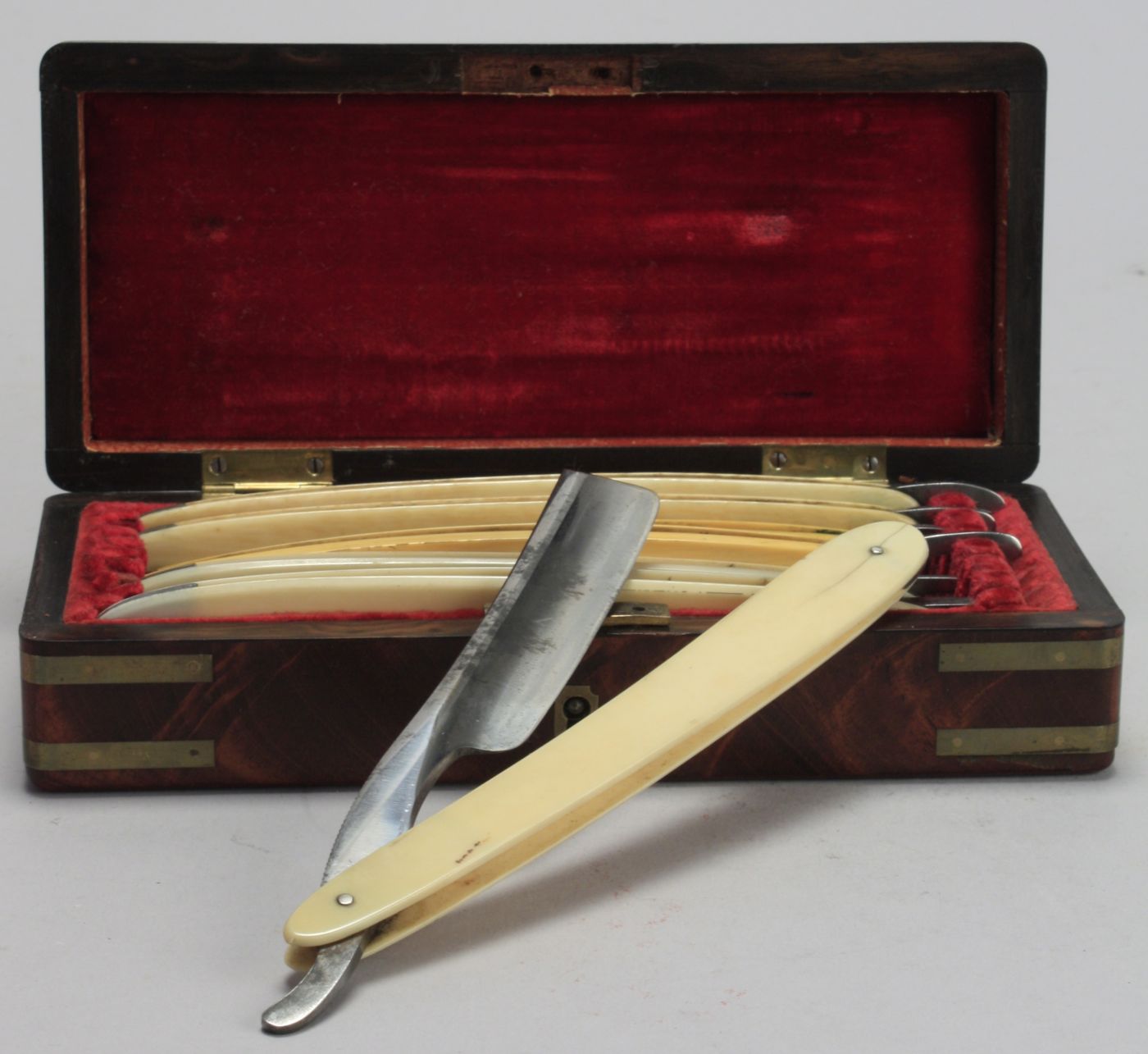 BOXED SET OF SEVEN STRAIGHT-EDGE