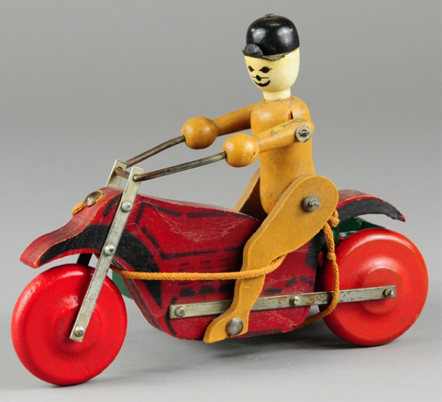BOY ON MOTORCYCLE WITH SIDE CAR