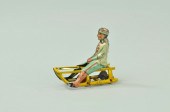 BOY ON SLED PENNY TOY Meier Ge