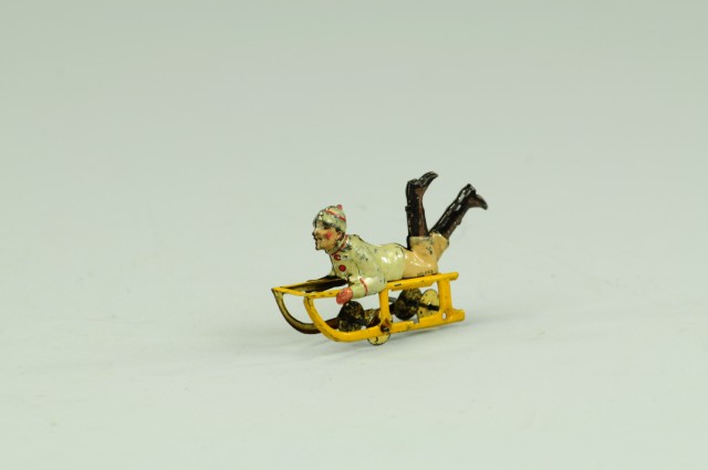 BOY ON SLED PENNY TOY Meier Germany