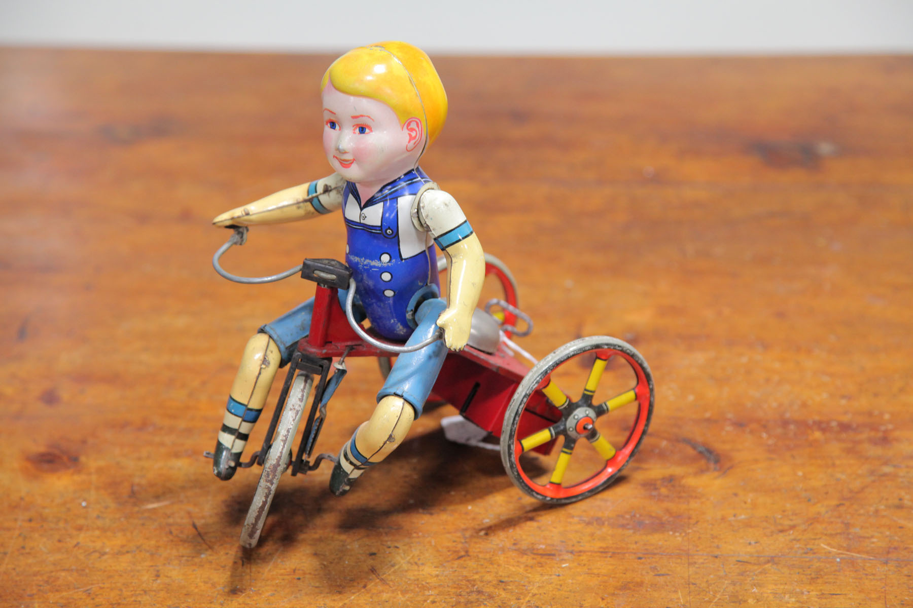 BOY ON TRICYCLE WIND-UP.  First