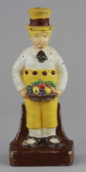 BOY WITH FRUIT BASKET DOORSTOP