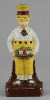 BOY WITH FRUIT BASKET DOORSTOP
