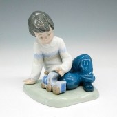 BOY WITH TRAIN - NAO BY LLADRO