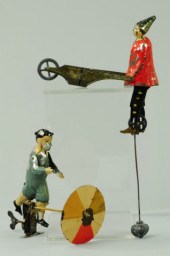 BOY WITH UMBRELLA AND CLOWN PU