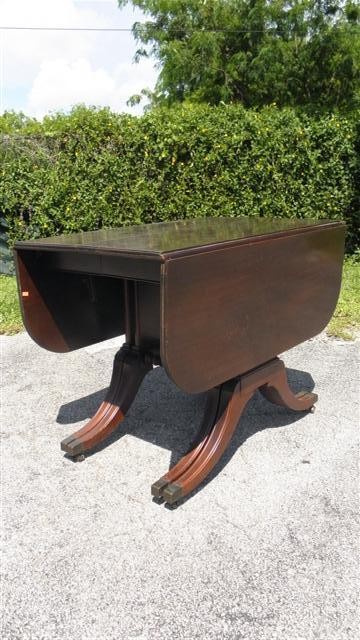 Brandt drop leaf table with sabre