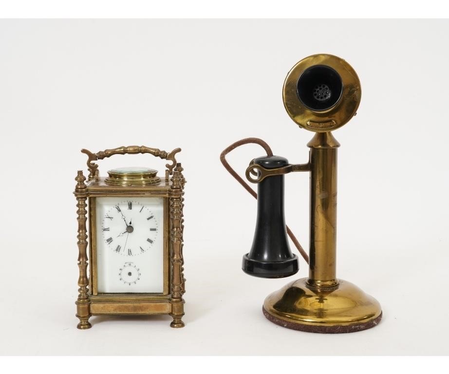 Brass and beveled glass carriage
