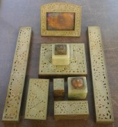 BRASS AND CARVED SERPENTINE EI