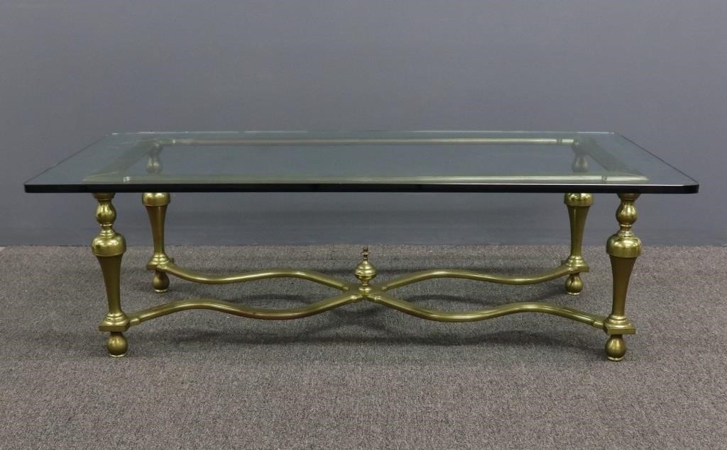 Brass and heavy glass coffee table,