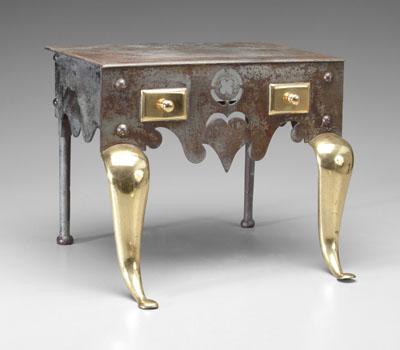 Brass and iron footman, cabriole