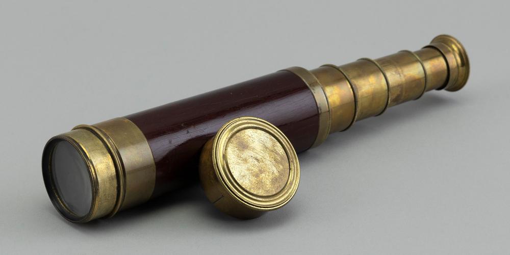 BRASS AND MAHOGANY FOUR-DRAW