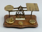 BRASS AND WOOD POSTAL SCALE 19