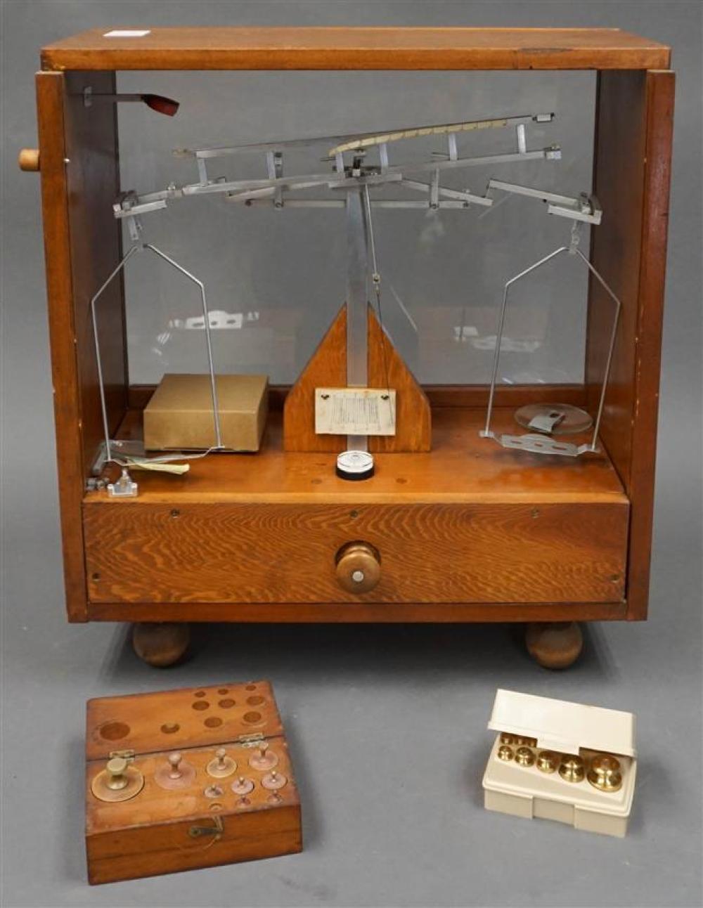 BRASS BALANCE SCALE IN A DUST PROOF