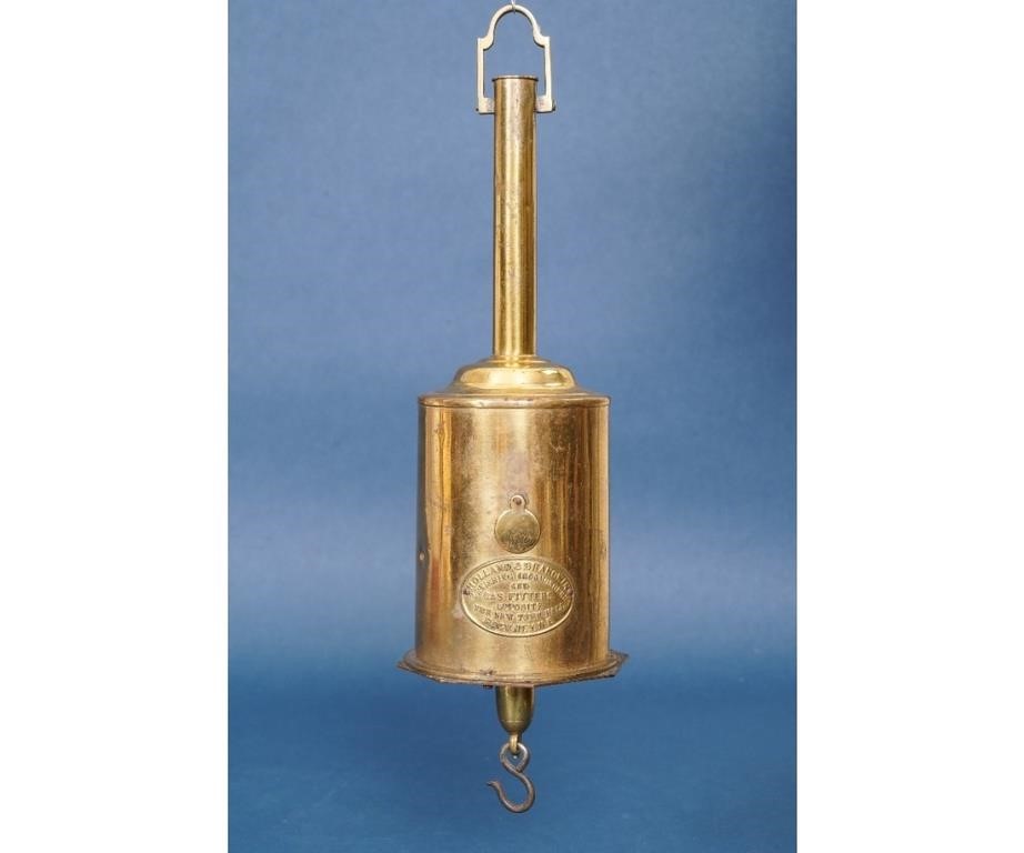 Brass clock jack signed "Holland