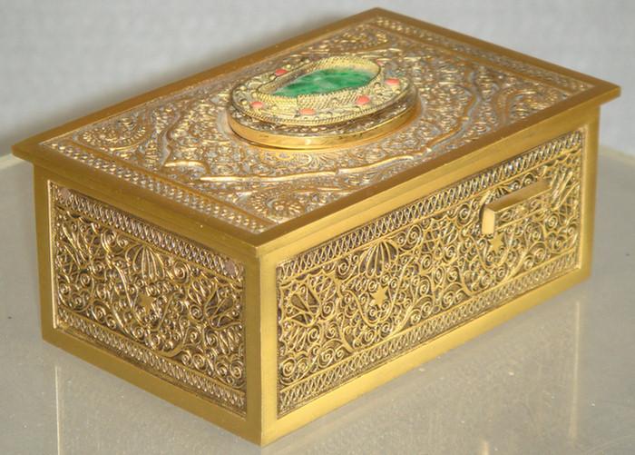 Brass filigree musical bird box,