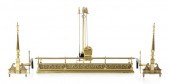 Brass fireplace ensemble consi