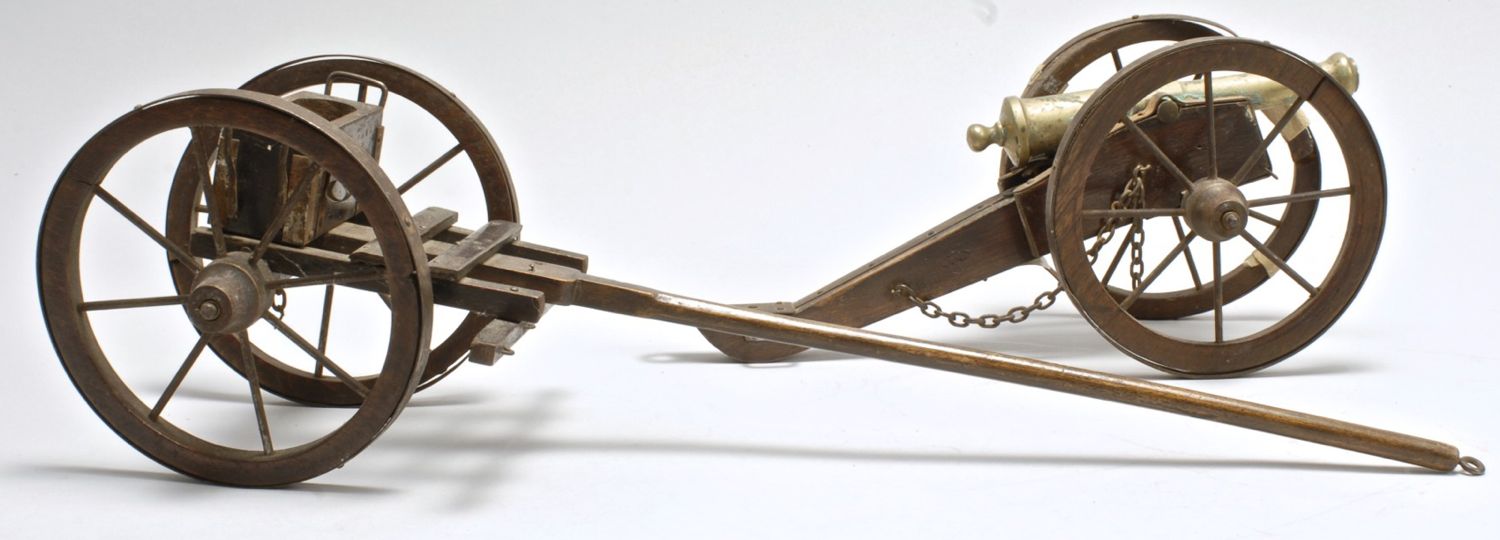 BRASS MODEL OF A CANNONWith