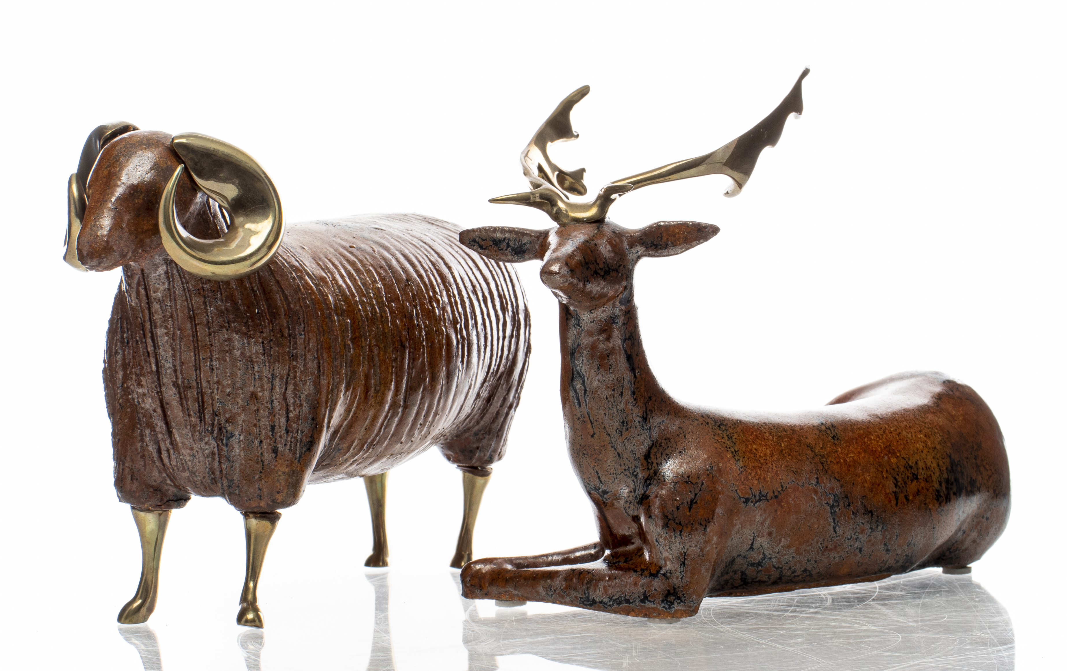 BRASS MOUNTED POTTERY SCULPTURES OF