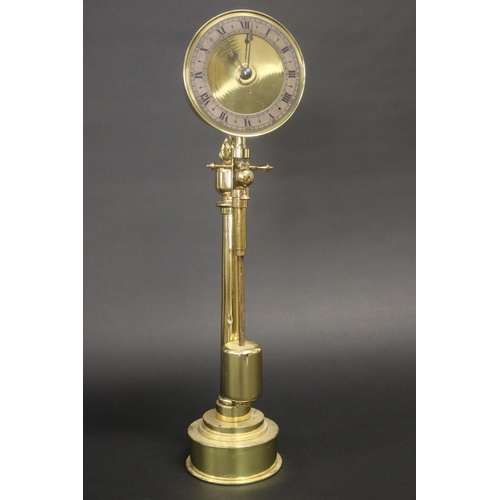 Brass pedestal clock, has