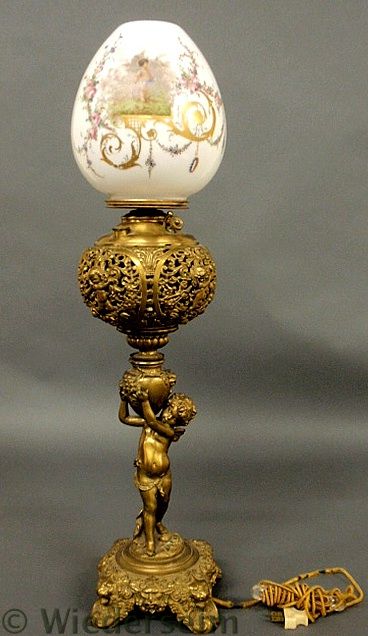 Brass piano lamp with cherub