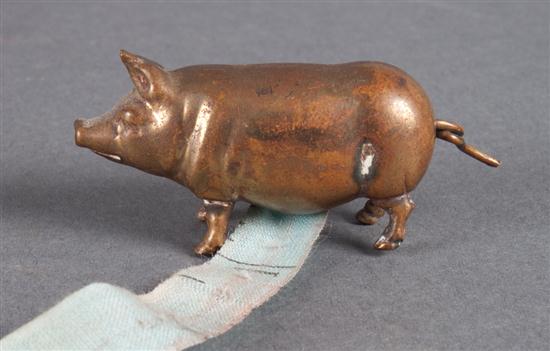 Brass pig figural sewing tape early