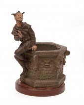 BRASS PLANTER WITH A JESTER ON