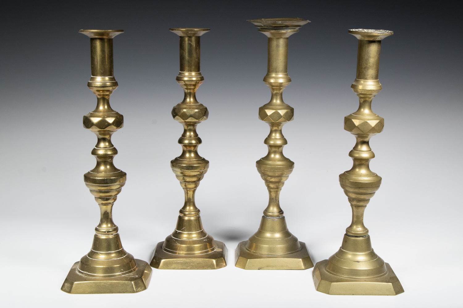 BRASS PUSH-UP CANDLESTICKS Group of