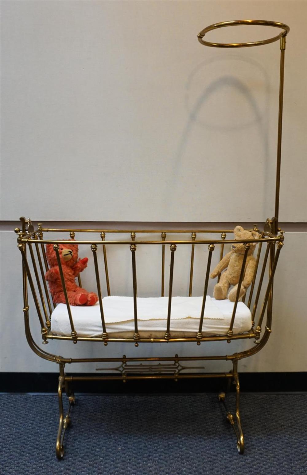 BRASS ROCKING CRADLE ON
